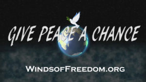 Logo of Winds of Freedom Foundation with words Give Peace a Change over a globe topped with a dove carrying an olive branch, the classic symbol of peace. 